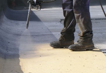 Coating systems over Dayton spray foam roof systems